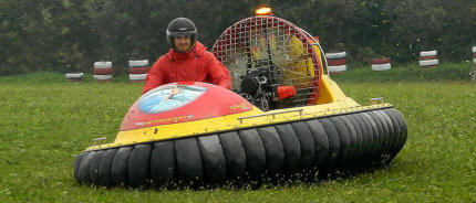 Driving MAD-81L hovercraft on grassfield